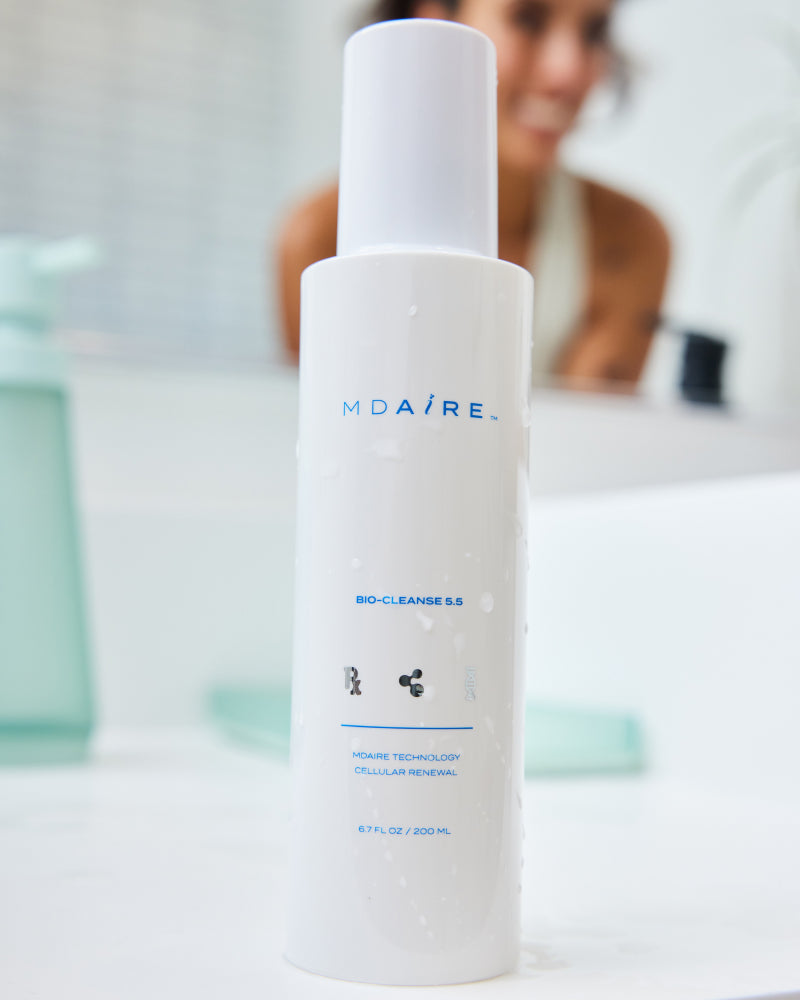 Bio-Cleanse 5.5 Face wash bottle with water droplets standing on white surface gallery position 1